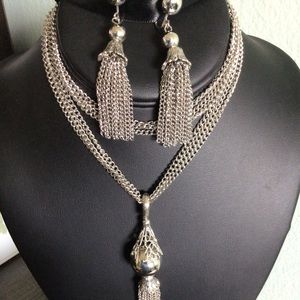 Stunning tassel pendant necklace and earrings.